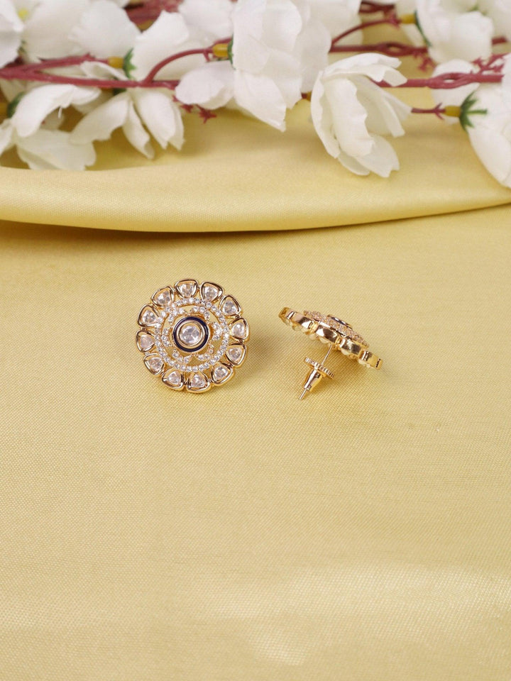 Maryam Kundan Polki Stud Earrings - by Live Some India in just A closeup image of Maryam Kundan Polki Blue Stud Earrings -1 by Live Some India on a yellow satin cloth with flowers