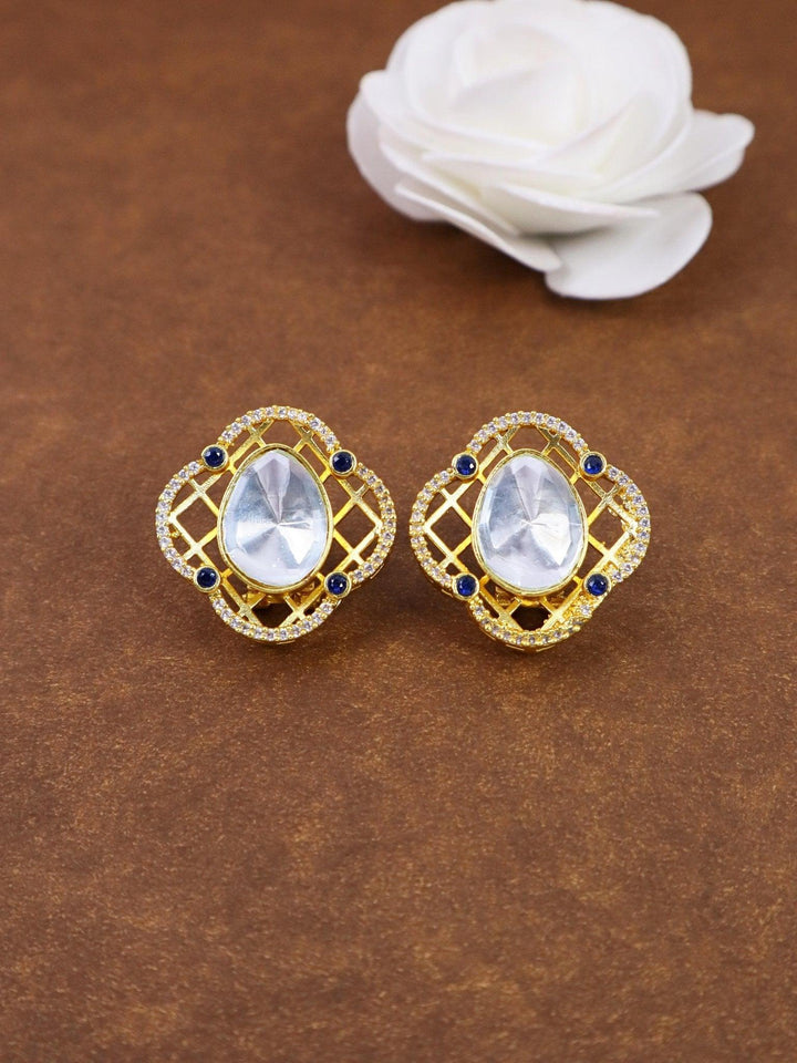 Moti Kundan Polki Stud Earrings - by Live Some India in just A closeup image of Moti Kundan Polki Stud Earrings by Live Some India on a brown background with a white rose