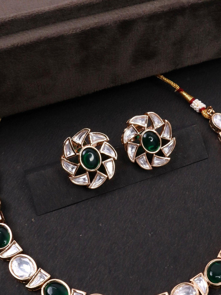 Delicate Green Stone Kundan Polki Necklace Set - by Live Some India in just A closeup image of Delicate Kundan Polki Earrings by Live Some India on a black background