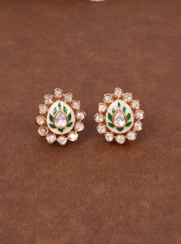 Uryam Kundan Polki Stud Earrings - by Live Some India in just A closeup image of Uryam Kundan Polki Green Stud Earrings by Live Some India on a yellow satin cloth with flowers